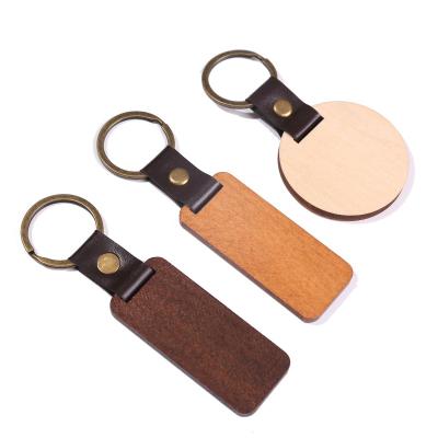 China 2021 Everyday and American Life Beech Leather Wooden Key Ring Letter Key Chain European Monogram Personalized Wooden Key Chain for sale