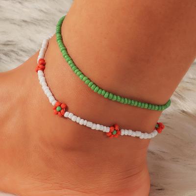 China 2Pcs/set INS TRENDY Daisy Seed Bead Foot Chain Simple For Women Girls Foot Anklet Chain Beaded Jewelry for sale