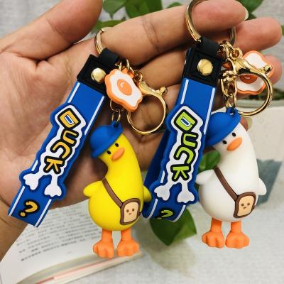 China Cute Cartoon Anime Design 3d.customize Cartoon Tipped Rubber Silicone Bag Duck Key Chain PVC Key Pendant for sale