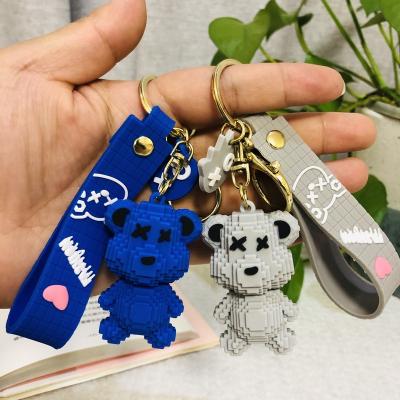 China Wholesale 3D Anime Cartoon Drop Glue Bear Rubber Key Chain Dark Key Pendant Small Gift Bag for sale