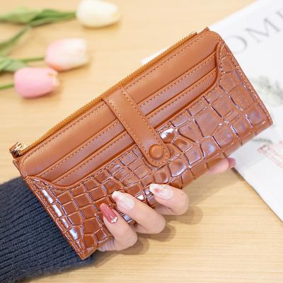 China Large capacity anti-theft stone pattern grab brand design ladies pinch 2023 fashion wallets for women for sale