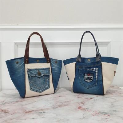 China Japan style high quality spliced ​​jeans bag 2023 ladies handbags women shoulder sling bags fashion shoulder armpit bag for sale