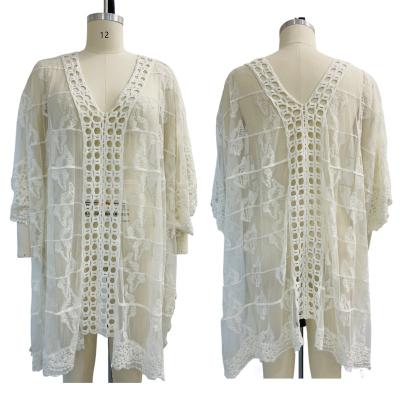 China Plus-size anti-static clothing for women sexy hollow lace pungent white color beach cover up for sale