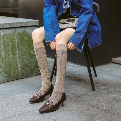 China Fashion Breathable Trend Socks Brand Designer Socks Gold Silk Cotton Letter Socks for sale