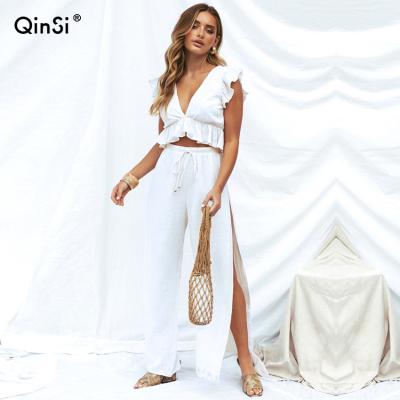 China 2 Pieces Breathable QINSI Amazon Women's Outfits Upper Side Deep V Neck Crop Split Drawstring Wide Leg Pants Set Overalls for sale