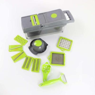 China 13PCS plaats Multifunctionele Hand Plantaardige Snijmachine met Schilmesje Te koop