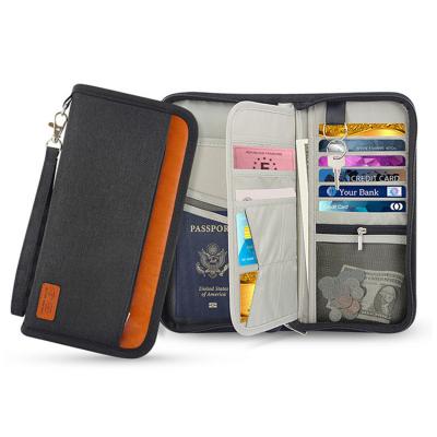 China Large Capacity Universal RFID Blocking Business Card Organizer Travel Passport Wallet Passport Holder for sale