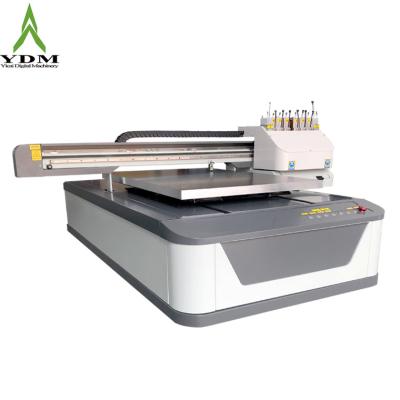 China Digital Printing Shops UV Small Plate 6090 Flatbed Printer For Printing Mobile Phone Case And Bottle for sale