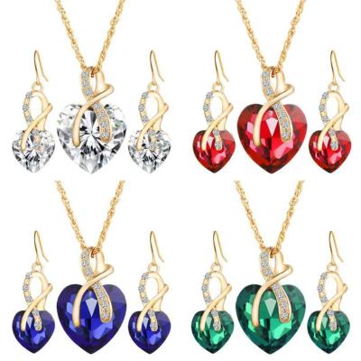 China Cute Fashion Gold Plating Jewelry Set Red Zinc Alloy New Design Women Bridal Wedding Gifts Crystal Heart Necklace And Earring for sale