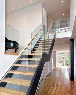 China Modern Standard Modern Apartment Steel Staircase Design Black Steel Plus North American Walnut Treads. for sale