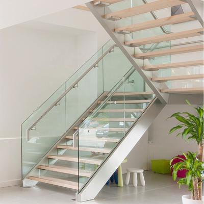 China Steel Staircase ISO Approved Modern Steel Staircase With Tempered Glass Railing for sale