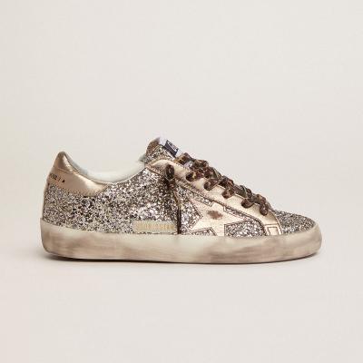 China Fashion trend Super-star sneakers in platinum color glitter with star and heel tab in tone-on-tone laminated leather sneakers Goldens Gooses for sale