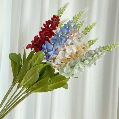 China Beautiful Selling Good Quality Long Stem Colorful Hot Silk Flower Artificial Delphinium Flower For Wedding Home Decor for sale