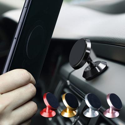 China New Universal 360 Magnetic Rotating Cell Phone Holder Metal Magnet Car Mobile Phone Holder for sale