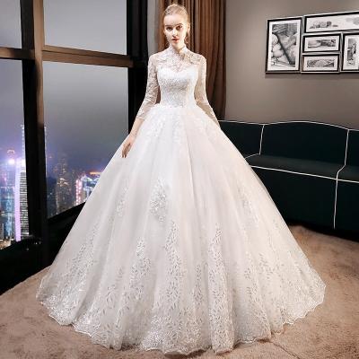 China New Design Anti-Static Long Sleeve Light Wedding Dress Vintage Bridal French Conservative Neck Backless High Neck Long Train for sale