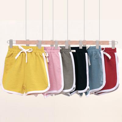 China Fashion Breathable And Hot Sale Simple Design Kids Boys And Girls Cotton Solid Color Knickers Shorts With Logo For Custom Shorts For Kids Boys for sale