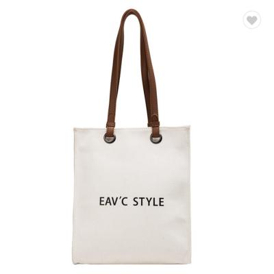 Chine Les femmes ont adapté la toile aux besoins du client réutilisable de sacs Tote Bag 10oz avec les poignées en cuir à vendre