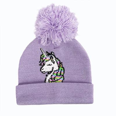 China Outdoor cute kids knitted beanie hats girls knitted winter hats with pom poms for sale