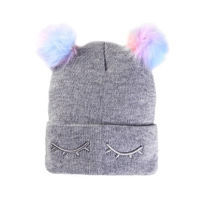 China Outdoor cute teens knitted beanie hats girls knitted winter hats with pom poms for sale