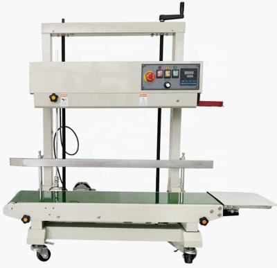 China FR-1100 Food Vertical Automatic Continuous Strip Sealing Machine For Rice Pack Bag for sale