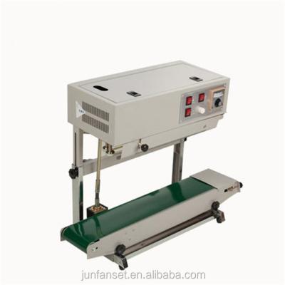 China FR-900V Beverage Stainless Steel Vertical Automatic Continuous Strip Liquid Sealer For Plastic Film for sale