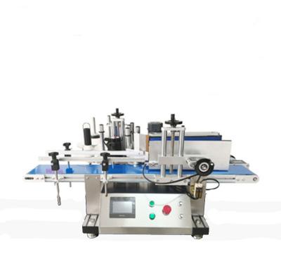 China Food Automatic Desktop Round Bottle Vertical Labeling Machine for sale