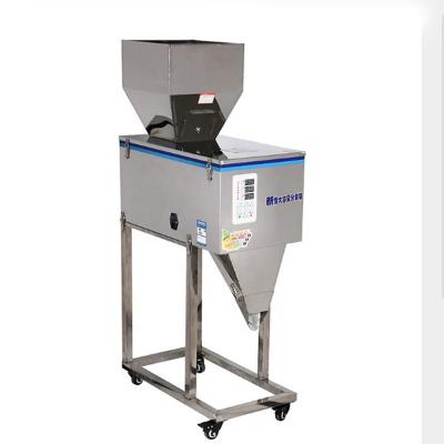 China 999g Food Powder Filling Machine Weigh Vibratory Filler Filler For Tea Bag /seed/grain for sale