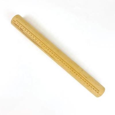 China Viable Customized Non-Stick Size French Cookie Dessert Making Solid Wood Rolling Pin With Scale for sale