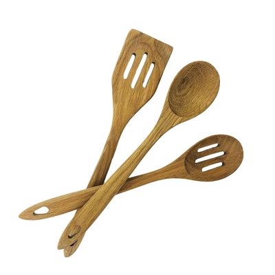 China Sustainable OEM Custom 3 Pcs Oak Wood Kitchen Utensils Set With Long Handle Accessories Cooking Work Permeable Turners Shovel Flat Spatula for sale