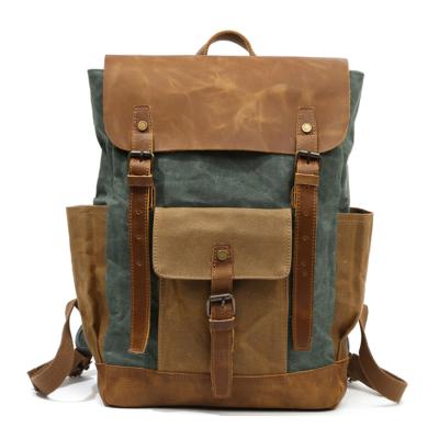 China Waterproof Waxed Canvas School Backpack Travel Large Hiking Rucksack Laptop Backpack Unisex Canvas Rucksack for sale