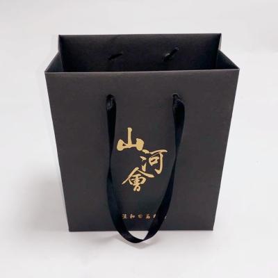 Chine Épicerie de sacs en papier de Papier d'emballage de café/cadeau avec le logo de timbre de feuille d'or à vendre