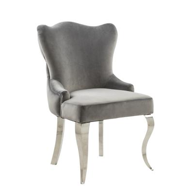 China Luxury Hot Selling Gray Velvet Upholstery Button Tufted Back Stainless Legs Dining Chair For Restaurant for sale