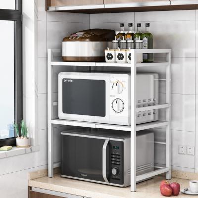 China Workable White Color Adjustable Storage Racks Kitchen Standing Double Layer Microwave Oven Rack for sale