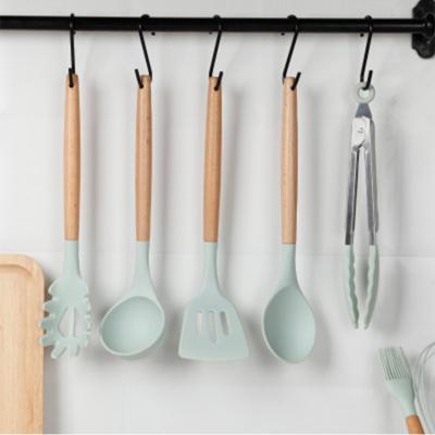 China Best Selling Sustainable Wooden Kitchen Accessories Set 11pcs Silicone Cookware Sets for sale