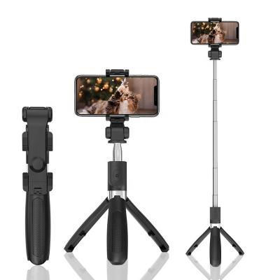 China Wholesale L01s Mini Wireless Smartphone Selfie Stick Foldable Monopod Selfie Stick Tripod With Remote Shutter for sale