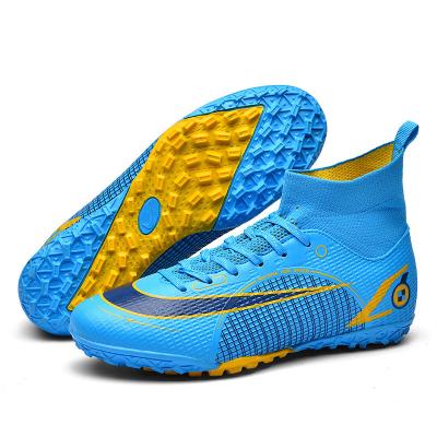 China Custom 2023 Sports Kids Football Boots Soccer Boots Rubber Men's Indoor Boys Fashion Summer Winter Cotton White Blue Box Black for sale