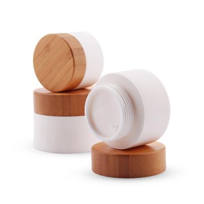 China High Quality PP Plastic Cosmetic Skin Care Cream Bamboo Lid Jar Packaging for sale