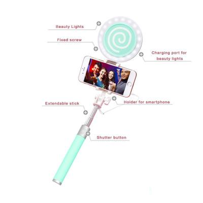 Chine Mini bâton superbe de Monopod Selfie avec le bâton télescopique de Selfie de forme de lucette de Bluetooth à vendre