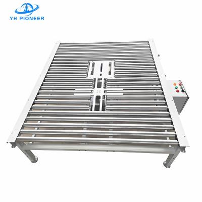 China Durable Cross Rotary Conveyor 0.75KW Power For Food And Chemical Industries for sale