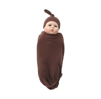 China Cozy baby clothes European and American newborn scarf modal wrap clothes holding quilt hat hair belt three-piece baby sleeping bag for sale