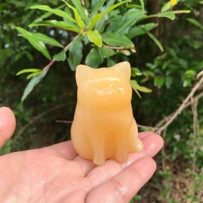 China Wholesale Natural Yellow Cat Hand-Carved Animal Crystal Craft Gift Europe Calcite Home Decoration for sale