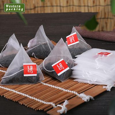 China Biodegradable Custom Small Mesh Roll Pyramid Drawstring Nylon Tea Bag With Tag for sale