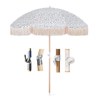 China Minimalist Bohemian Parasol Sun Rvitage Luxury Beach Umbrella With Tassels Boho Outdoor Beach Umbrella for sale