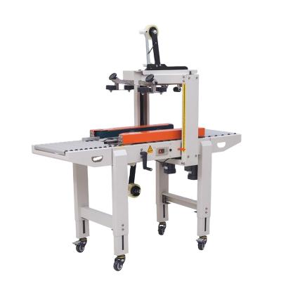 China Food Carton Sealer Box Food Sealing Packaging Machine With Side Belt Conveyor for sale