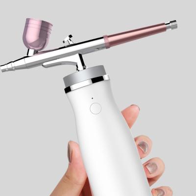 China Automatic Handheld Gun Mini Airbrush Set Portable Wireless Airbrush Home Use+travel Rechargeable Cordless Airbrush Compressor For Home for sale