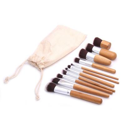 China Latest Design 11 Pcs Bamboo Handle Makeup Brush Set Skin-friendly With 1 Linen Bag Packing for sale