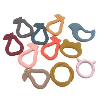 China Customized Colors Silicone Pear Shape Chew Pacifier Teething Baby Newborn Teethers 85 X 61mm for sale