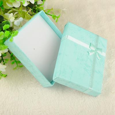 China Recycled Materials 2021 Custom Ribbon Bow Cardboard Gift Box Hot Stamping Gift Box for sale