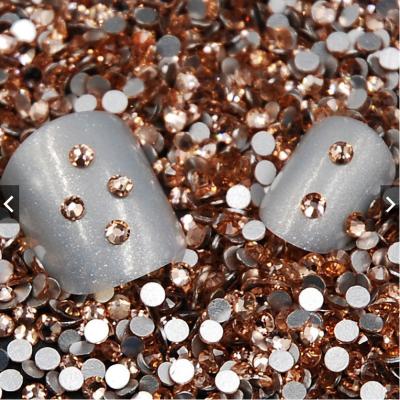 China Flatback HEPING SS3-SS40 Champagne Stones for Nail Art Flatback Non Hotfix Glue on Top Grade Light Peach Crystals Fake Stones for sale