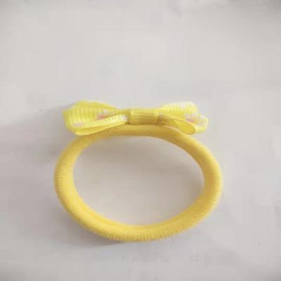 China Hot Selling Explosive Kids Cloth Art Bowknot Girl Heart Bowknot Towel Ring Hair Rope Bump Color Reusable Female Hair Band for sale